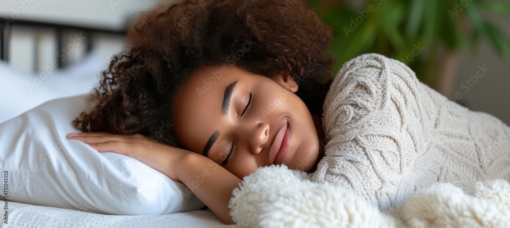Serene african american woman in 20s, peacefully sleeping on white bed, copy space available