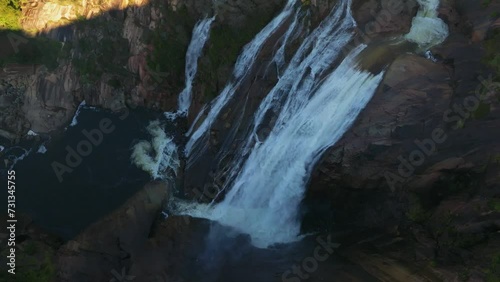 Drone slow-motion of Ezaro Waterfalls in Mountainous Area of Xallas River in Dumbria, A Corua, Spain photo