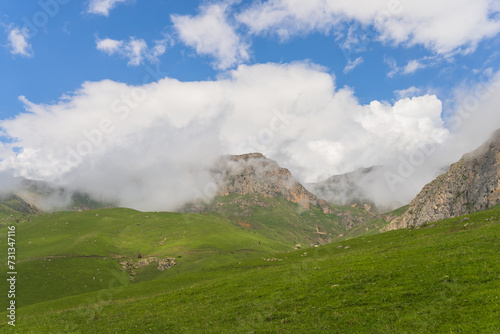 Green mountains covered with cloud, natural scene