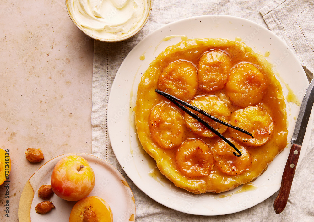 A plum tart tatin on a plate