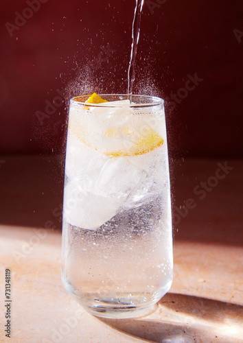 Lemonade in a glass with fizzy bubbles