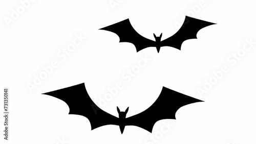 Flat-style bat flying animation against a green background. Seamless loop footage. photo