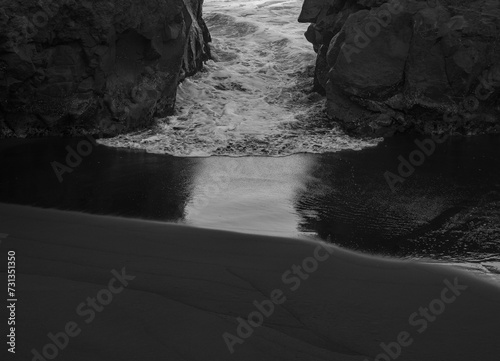 beach with black volcanic sand on  Tenerife photo