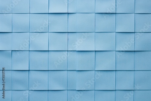 Blue chart paper background in a square grid pattern