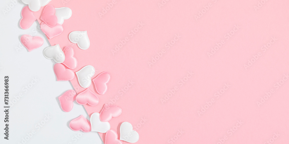 Pink and white background with pink and white hearts. Valentine's Day concept