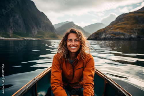 Portrait of a 20 years old woman in a canoe floating on the water among the fjords. Generative AI © Lucas