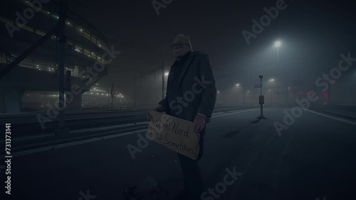 Depressed Unemployed Senior Homeless Beggar Being Poor After Job Loss photo