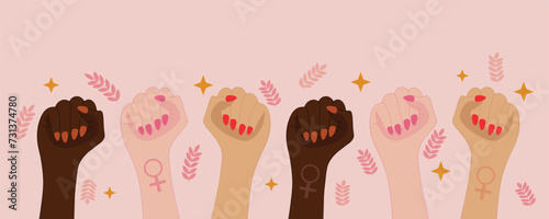 Many female hands with clenched fists on pink background. International Women's Day