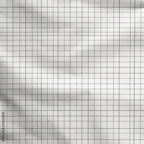 Gray chart paper background in a square grid pattern