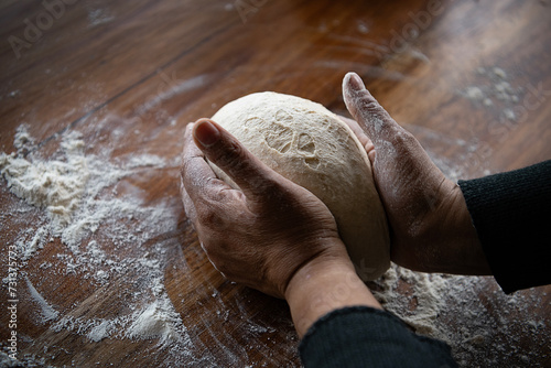 Chef hands making bread dough  photo