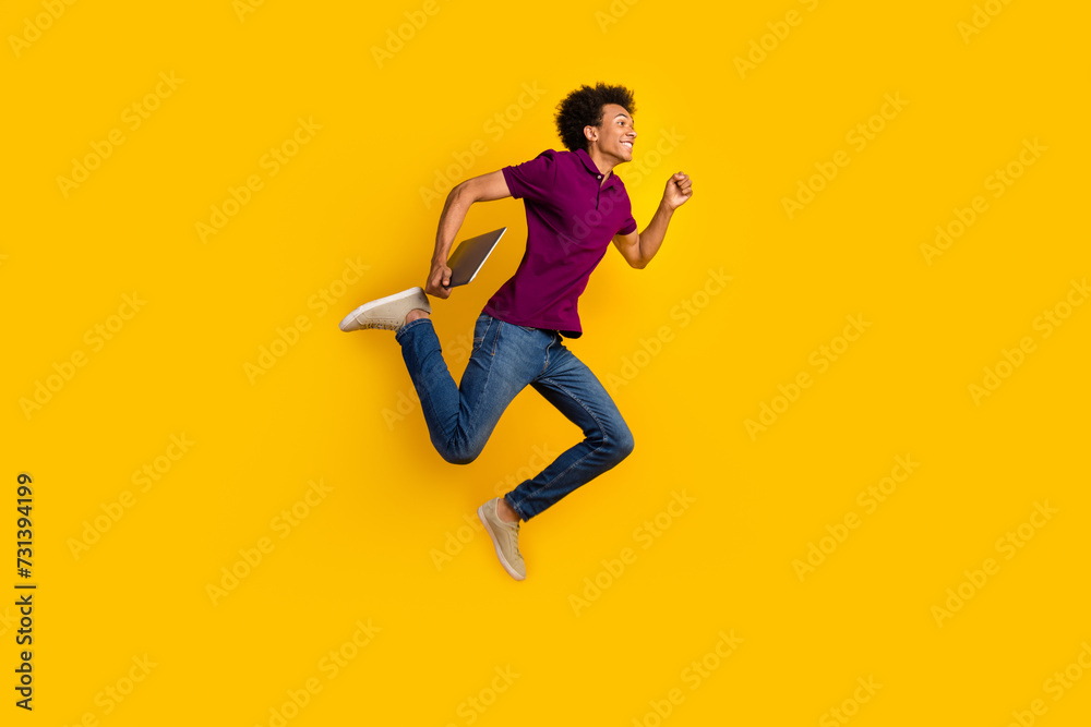 Profile side photo of cheerful nice man wear trendy polo running hurrying sale empty space isolated on yellow color background