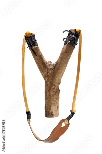 homemade wooden slingshot on cutout background photo