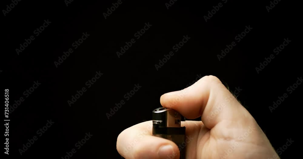 Thumb spark: Delve into the captivating sight of a thumb igniting a lighter, sparks transforming into flames in mesmerizing slow motion Thumb spark: Delve into the captivating sight of a thumb igniting a lighter, sparks transforming into flames in mesmerizing slow motion