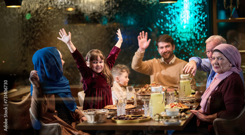 A modern and traditional European Islamic family comes together for iftar in a contemporary restaurant during the Ramadan fasting period  embodying cultural harmony and familial unity amidst a