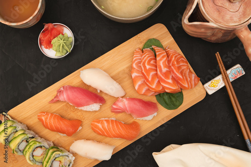 Salmon and Tuna sashimi and sushi served with green tea and miso soup