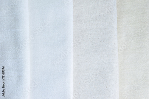stack of white cotton clothes, textile fashion industry