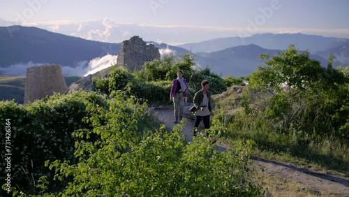 a couple doing trekking in abruzzo at rocca calascio abruzzo italy photo