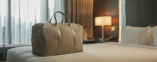 A banner with copy space and a sleek luxury garment bag situated in a well-lit, sophisticated hotel room, suggesting high-end travel comfort.