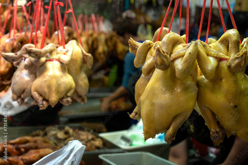 Boiled chicken hanging for sale at local markets, important items used in worship according to Chinese tradition, Chinese New Year Festival