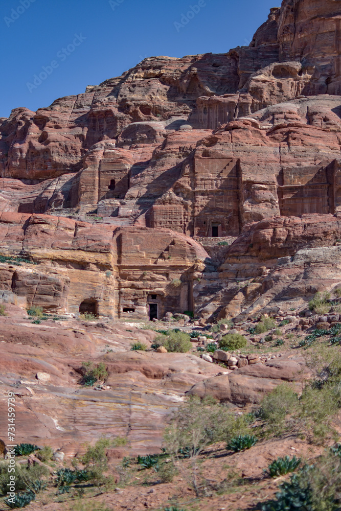 Ancient tombs carved into the rock in the city of Petra, Wadi Musa, Jordan.