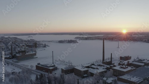 Drone shot of the seafront buildings of Vaasa and Vasklot and Hietasaari islands at sunset, Finland photo