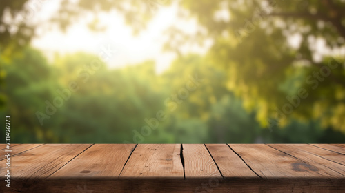 Empty wooden table with forest background