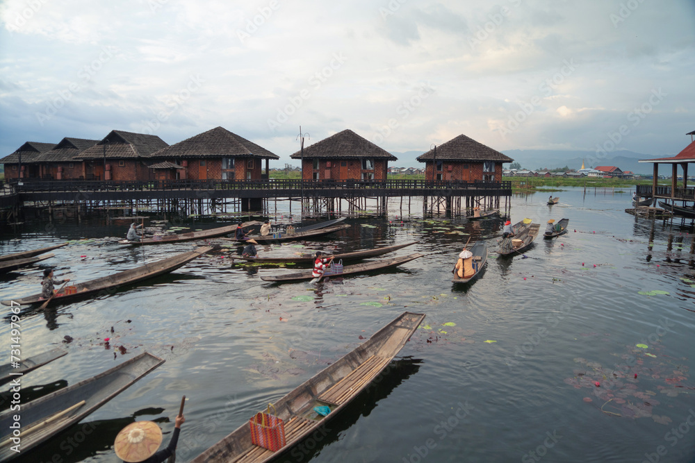 Damnoen Saduak Floating Market or Amphawa. Local people sell fruits, traditional food on boats in canal, Ratchaburi District, Thailand. Famous Asian tourist attraction destination. Festival in Asia.