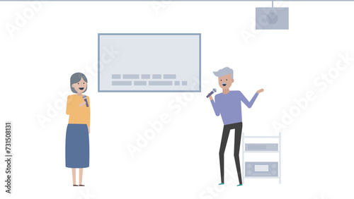 カラオケ喫茶でマイクを持って歌うシニアの男女