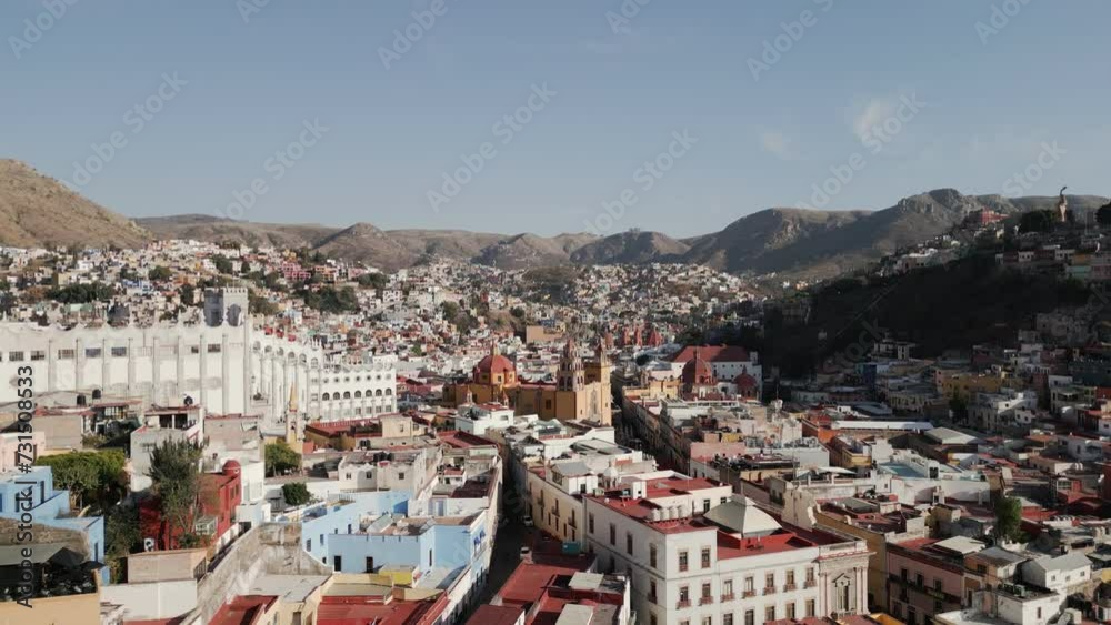 Drone Flies Above Guanajuato City Center in Mexico during Daytime: Catholic Church, University Buildings Drone Flies Above Guanajuato City Center in Mexico during Daytime: Catholic Church, University Buildings