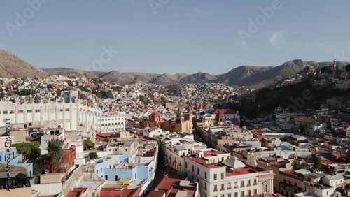 Wallpaper Mural Drone Flies Above Guanajuato City Center in Mexico during Daytime: Catholic Church, University Buildings Torontodigital.ca