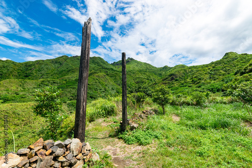 Abandoned rock fence and woods hidden in the hill in Jinguashi, New Taipei City.