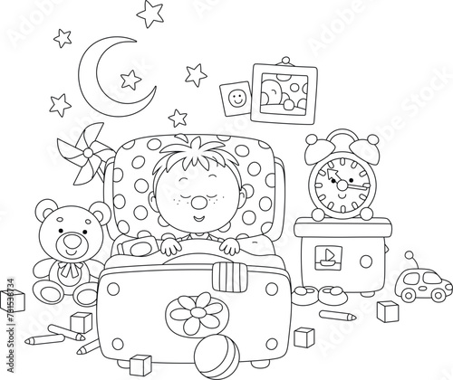 Little boy sleeping in his ...
