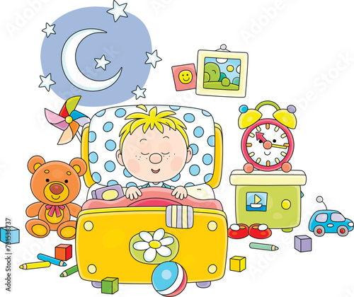 Little boy sleeping in his ...