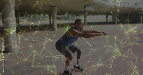 Image of yellow communication network over male athlete with prosthetic leg exercising outdoors