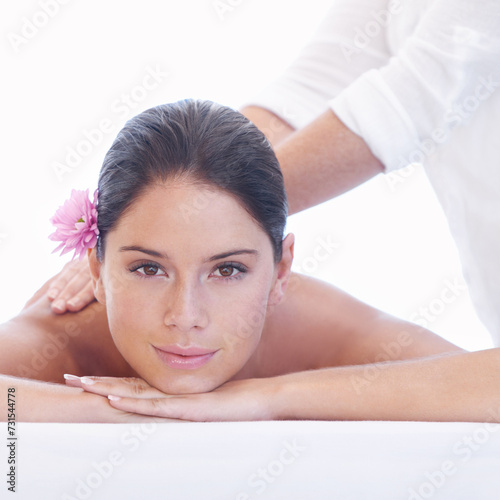 Relax, massage and portrait of woman on bed with smile for health with luxury holistic treatment. Self care, peace and girl on table with masseuse for body therapy, wellness and hotel spa service.