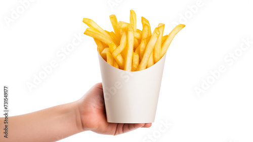 hand holding french fries in paper cup isolated on white background.