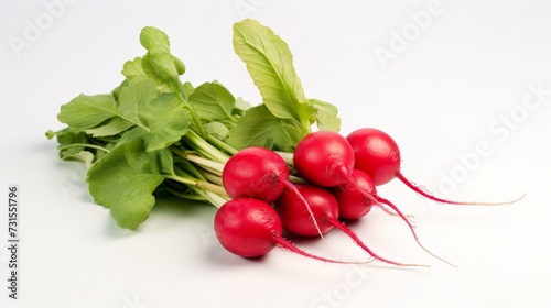 fresh red radish with crispy green leaves on white background