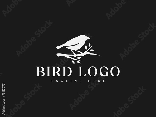 bird logo vector illustration. bird silhouette with tree branches logo template