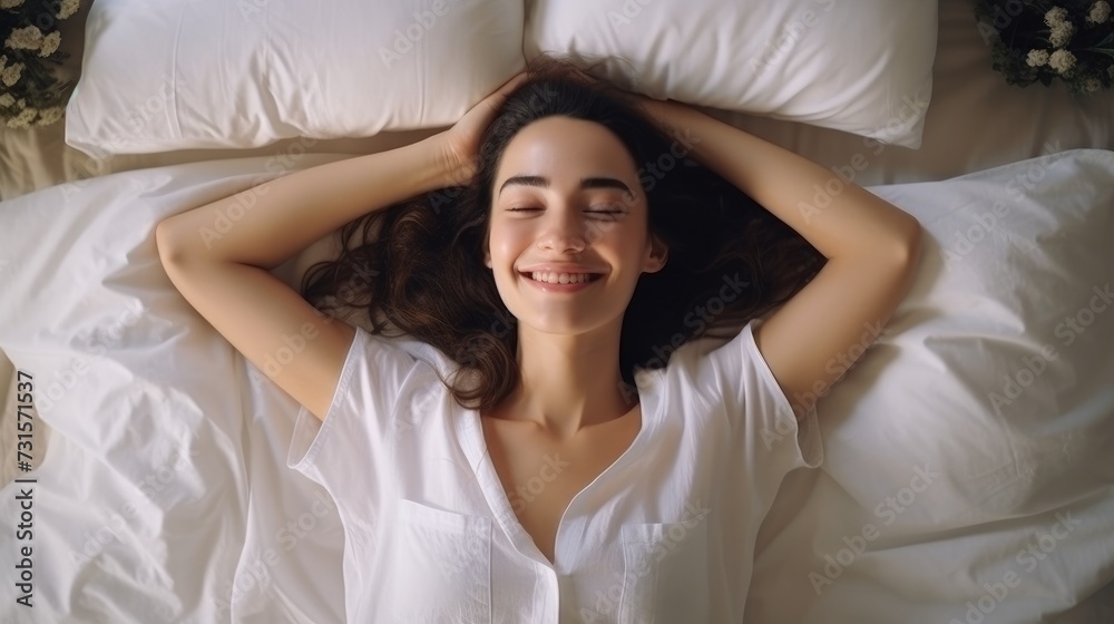Smiling Young Woman Enjoying Comfortable Morning in Bed. Smiling Young Woman Enjoying Comfortable Morning in Bed.