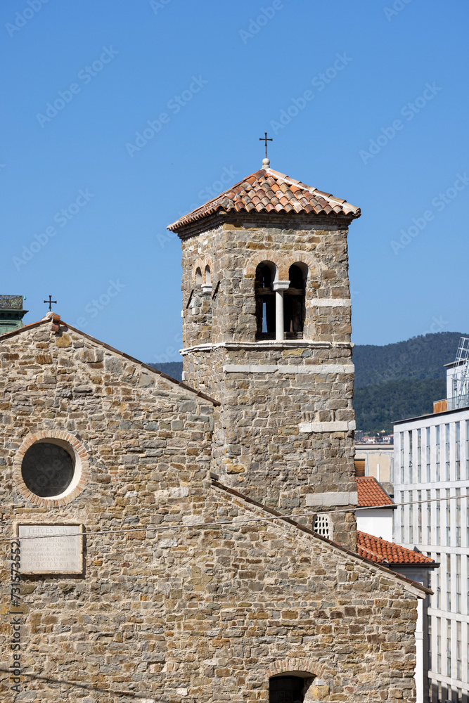 Medieval Basilica of San Silvestro with bell tower, Trieste, Italy