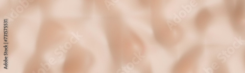 Φωτογραφία A smooth, undulating beige abstract design, perfect for use in luxury goods advertising, high-end editorial layouts, or sophisticated product presentations