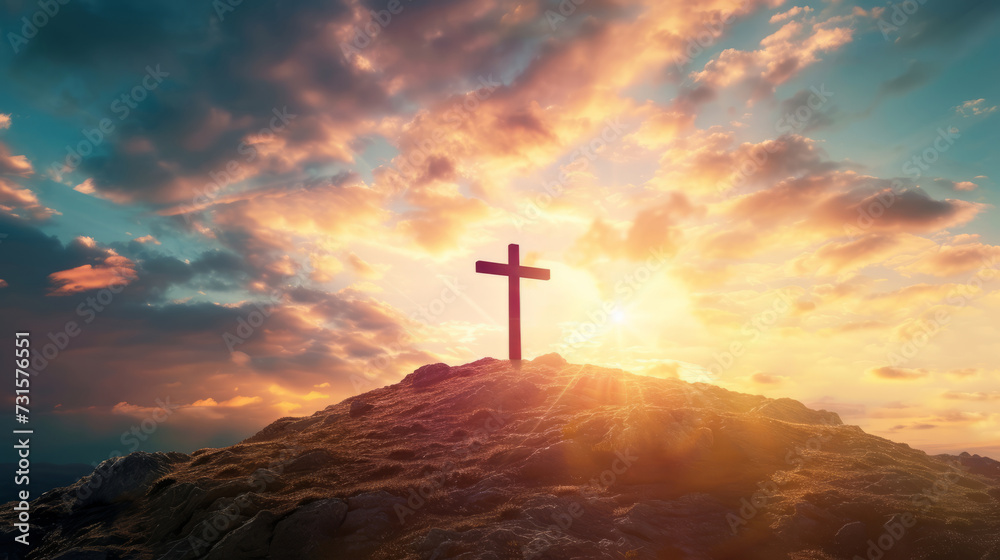 Holy cross on a hill against a bright sunset light background Holy cross on a hill against a bright sunset light background