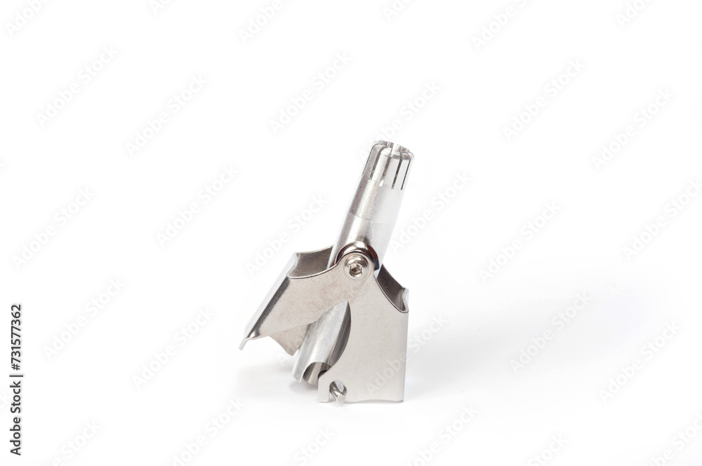 Mechanical trimmer for removing nose hair, made of light metal. Mechanical trimmer for removing nose hair, made of light metal.