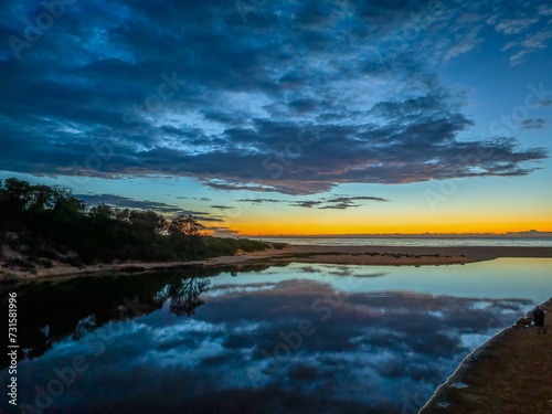 Fototapeta Naklejka Na Ścianę i Meble -  Summer sunrise at the seaside lagoon