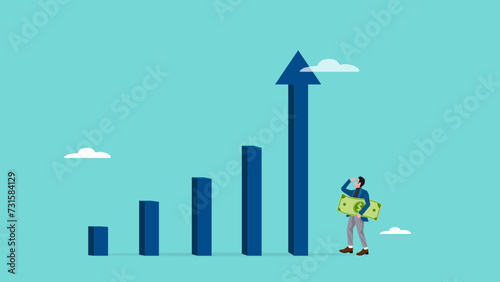 Grow business increase sales and profit, growth or progress to achieve goal, development to boost performance concept, businessman looking at high rising up graph arrow while carrying banknotes