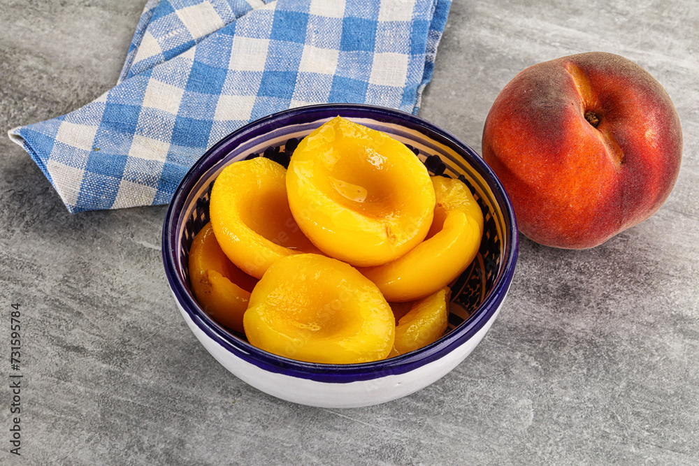 Ripe sweet and juicy canned peach Ripe sweet and juicy canned peach