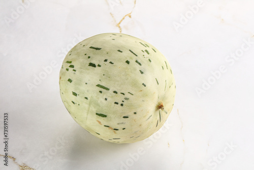 Ripe sweet juicy Dalmatin melon photo