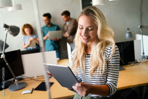 Startup business team on meeting in modern bright office interior and working together