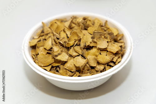 Dry plai (Zingiber cassumunar) sliced in bowl ingredient herb for herbal alternative medicine.