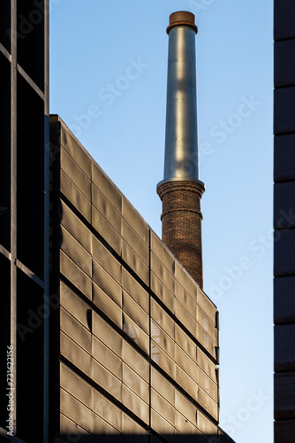 Chimney of an old factory in the Poblenou district of Barcelona in Catalonia Spain photo